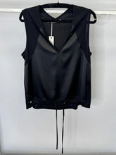 Load image into Gallery viewer, Black sleeveless top on a hanger against a white background