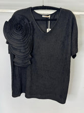 Load image into Gallery viewer, Black sweater with floral embellishment on a white background