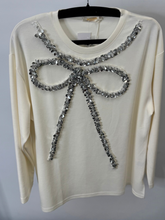 Load image into Gallery viewer, Malissa J WF2503 winter white sequin bow top—women’s embellished long-sleeve jersey top with silver bow detail.