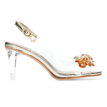 Load image into Gallery viewer, A pair of gold-colored heels with ankle straps