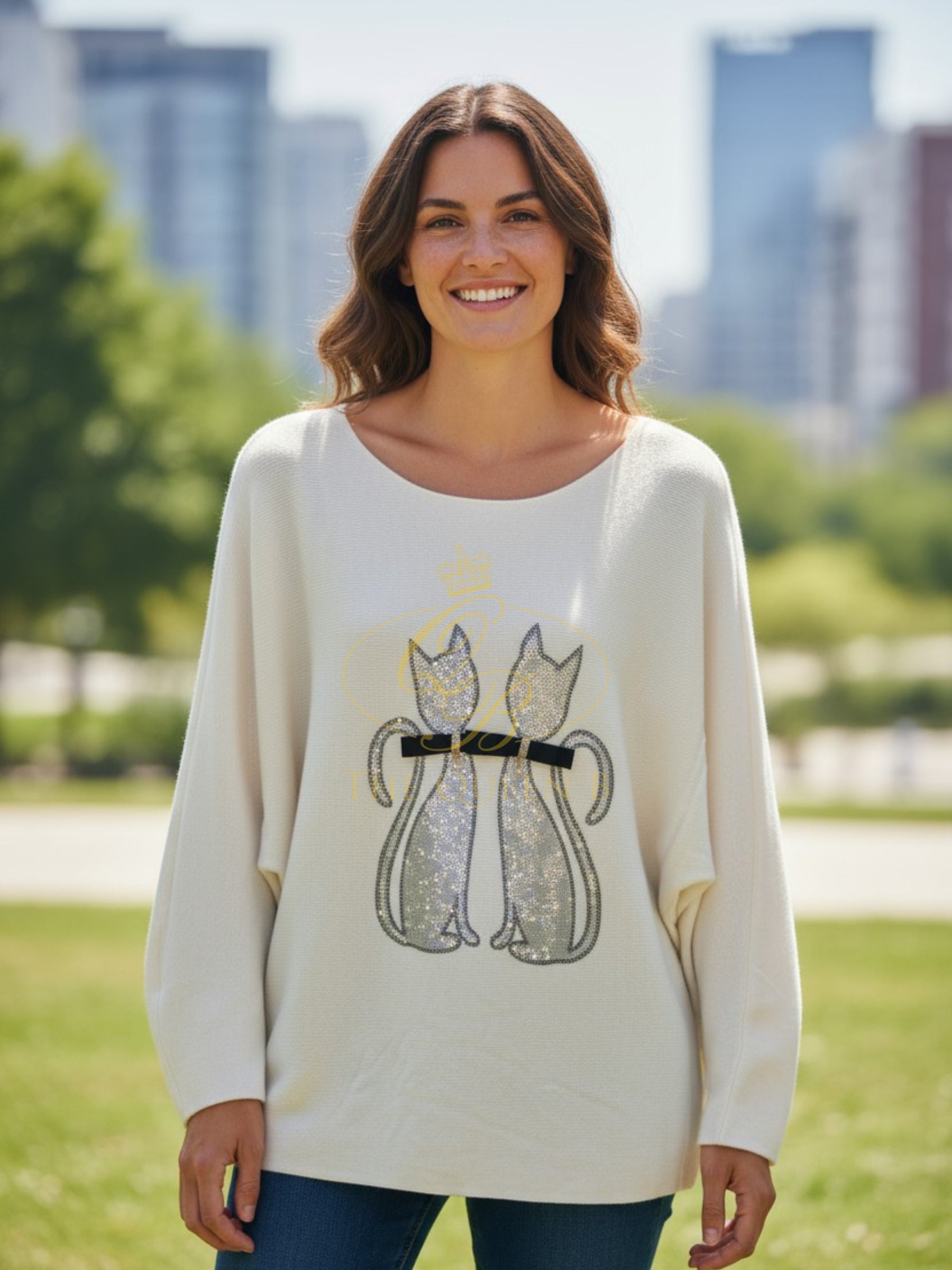 PARAMOUR PK8045 Ivory Jumper with crystal-embellished twin cat design, long sleeves, and a relaxed fit.