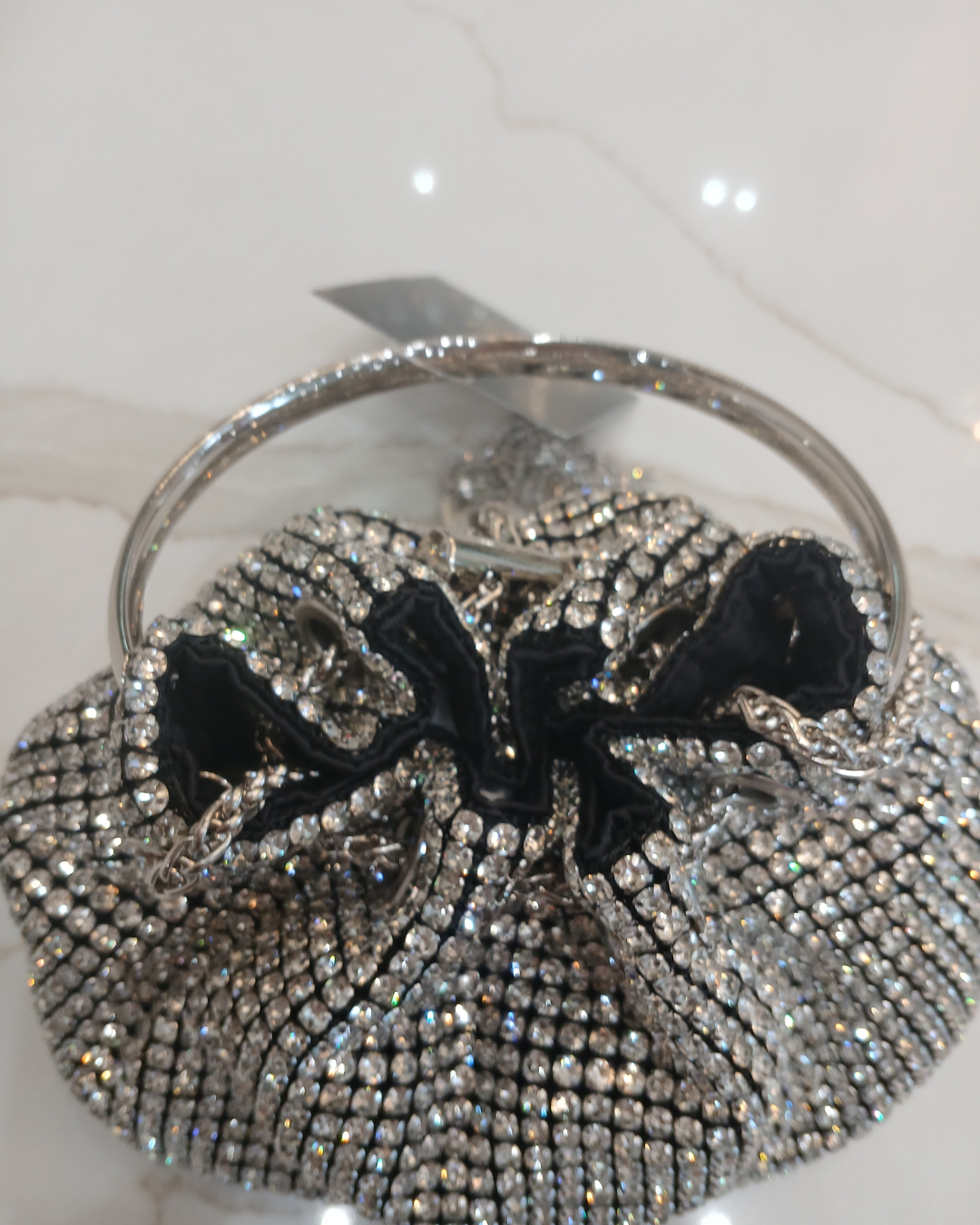 PCHA G1142 Silver Pouch Bag – embellished silver evening pouch with crystal detailing, ring handle and tassel drawstring closure, women’s statement party bag.