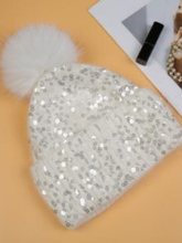 Load image into Gallery viewer, PCHA SD117 Cream Sequin Pompom Hat – cream knit hat with sequins and faux fur pompom, also available in black and red. Ideal for chic winter styling.