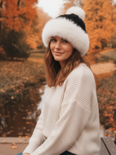 Load image into Gallery viewer, PCHA SD124 Black Faux Fur Trim Pompom Hat – black knit winter hat with cream faux fur trim and matching pompom. Perfect for stylish cold-weather outfits.