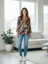 Load image into Gallery viewer, QBAW25 BC women’s animal print blouse with notch neckline, long sleeves, and relaxed silhouette – stylish top for versatile day-to-night wear.
