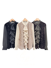 Load image into Gallery viewer, QBAW25 BC Black Floss Blouse featuring sequin embellishment, chiffon sleeves and cascading ruffle detailing.