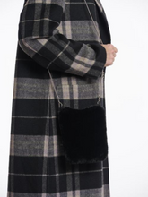 Load image into Gallery viewer, Women’s black faux fur crossbody bag with slim chain strap – soft plush evening bag perfect for winter outfits and chic day-to-night styling.