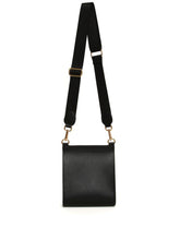 Load image into Gallery viewer, Alice Wheeler AW5968 Black Seville Cross Body Bag – women’s sleek black crossbody handbag with gold hardware, flap closure and adjustable strap, versatile everyday fashion accessory.
