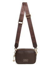 Load image into Gallery viewer, Alice Wheeler AW6158 Chocolate Mini Soho Cross Body Bag with branded strap, gold bee charm and compact design – elegant brown crossbody handbag for everyday use.
