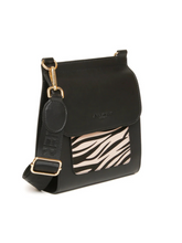 Load image into Gallery viewer, ALICE WHEELER AW6218 Zebra Bloomsbury cross body bag in vegan leather with gold hardware, magnetic flap closure and adjustable strap.
