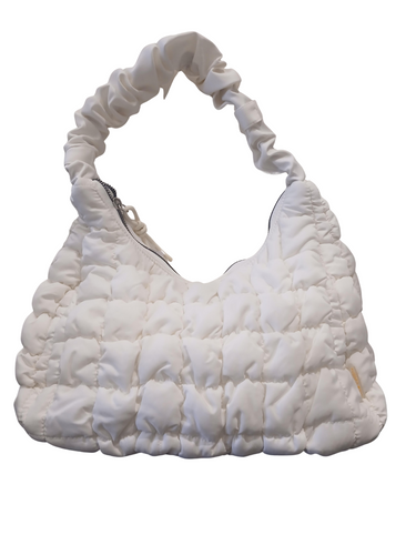 Stylish women's puffer handbag with soft texture, trendy design and zip closure, perfect for everyday fashion or casual outings.