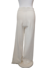 Load image into Gallery viewer, Alice Collins white knit-like trousers for women featuring a high-rise waistband and relaxed fit – ideal for stylish loungewear or casual everyday outfits
