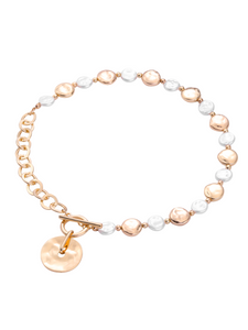 D&X DN2812K Gold Tone T-Bar Pearl and Disc Necklace – chic gold-tone plated alloy necklace with faux pearls, polished disc charm and T-bar fastening for modern elegance.
