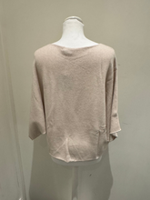 Load image into Gallery viewer, Cream long sleeve knit top by Deck by Decollage, featuring a relaxed silhouette and asymmetric hem
