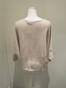 Cream long sleeve knit top by Deck by Decollage, featuring a relaxed silhouette and asymmetric hem