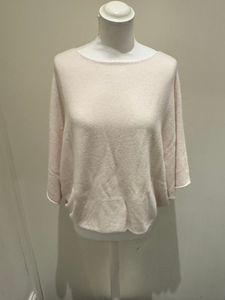 Deck by Decollage batwing knit top with a relaxed boxy fit, scoop neckline, and straight hem.