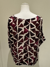 Load image into Gallery viewer, Deck by Decollage abstract Mulberry printed  top in berry and neutral tones, featuring a wide neckline and relaxed silhouette. Made from lightweight viscose for breathable comfort-perfect for bold, contemporary styling or matching co-ord looks.
