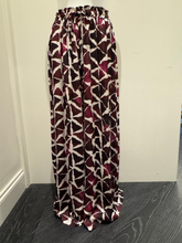 Load image into Gallery viewer, Deck by Decollage wide-leg trousers with an abstract berry and ivory print, featuring an elasticated waistband and fluid silhouette-designed for bold, stylish comfort.
