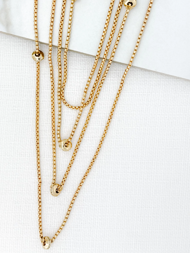 ENVY 4382 Gold Necklace featuring a layered chain design with gold-effect bead embellishments, a versatile women’s fashion necklace perfect for day-to-night styling.