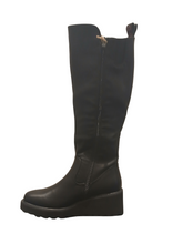 Load image into Gallery viewer, Heavenly Feet Foxtail Black knee-high wedge boots with faux leather finish, elasticated back panel, side zip and rugged sole - stylish women’s winter boots.
