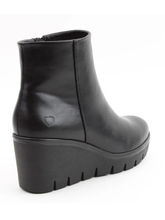 Load image into Gallery viewer, Heavenly Feet Fiorella Black Ankle Boot – women’s vegan-friendly wedge ankle boot with side zip, memory foam insole and 6.5 cm heel for stylish everyday comfort.
