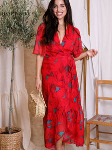 Hope & Ivy Delia Red Flutter Sleeve Maxi Wrap Dress – sustainable women’s red floral chiffon wrap dress with flutter sleeves and tie waist. Perfect for weddings, garden parties, and special occasions.