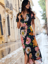 Load image into Gallery viewer, Hope &amp; Ivy Marlene Floral Dress – floral wrap maxi dress with pink, orange and ivory blooms, gold Lurex detail, flutter sleeves and tie waist. Perfect for weddings, garden parties and summer events.

