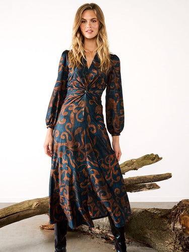 Women’s maxi dress in navy and bronze swirl print with twist-knot waist, long sleeves and flowing skirt - elegant occasion and workwear style.