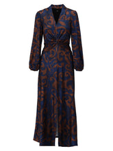 Load image into Gallery viewer, Women’s maxi dress in navy and bronze swirl print with twist-knot waist, long sleeves and flowing skirt - elegant occasion and workwear style.

