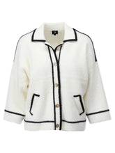 Load image into Gallery viewer, K Design B846 women’s black and white cardigan with contrast trim, gold-tone buttons, and front pockets - timeless knitwear for layering in autumn-winter.
