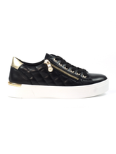 Load image into Gallery viewer, Black sneaker with gold accents on a white background
