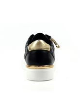 Load image into Gallery viewer, Black sneaker with gold accents on a white background
