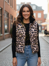 Load image into Gallery viewer, Leopard print vest with black interior on a white background
