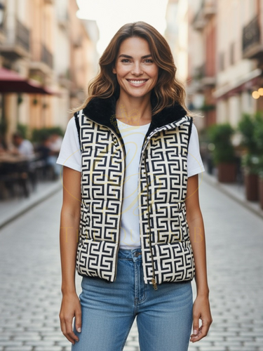 Black and white patterned vest with fur trim on a white background
