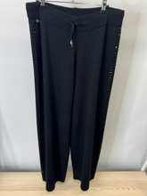 Load image into Gallery viewer, Malissa J WF2643 black studded knit trousers—women’s wide-leg knitwear pants with studded side detail and drawstring waist.
