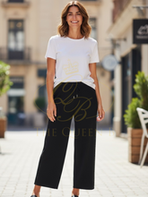Load image into Gallery viewer, Malissa J WF2643 black studded knit trousers—women’s wide-leg knitwear pants with studded side detail and drawstring waist.
