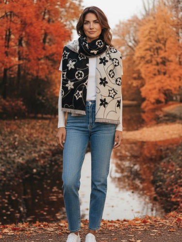 Malissa J GC21282 Black Reversible Scarf with Daisy and Disc Design Print – women’s reversible winter scarf in black and cream with floral pattern. Soft, stylish cold-weather accessory for elegant everyday looks.