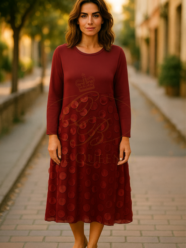 Elegant wine red midi dress with long sleeves, featuring a round neckline and textured polka dot mesh overlay