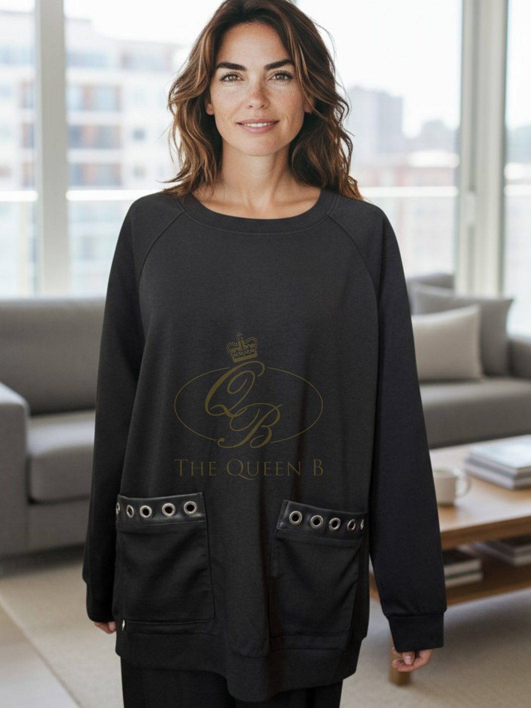 Malissa J WF2555 Black PU Top with long sleeves and PU-trim pockets-women’s neutral longline top with eyelet detail.