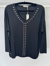 Load image into Gallery viewer, Malissa J black long sleeve V-neck top with silver stud eyelet detail - women’s chic evening blouse, versatile smart-casual fashion top.
