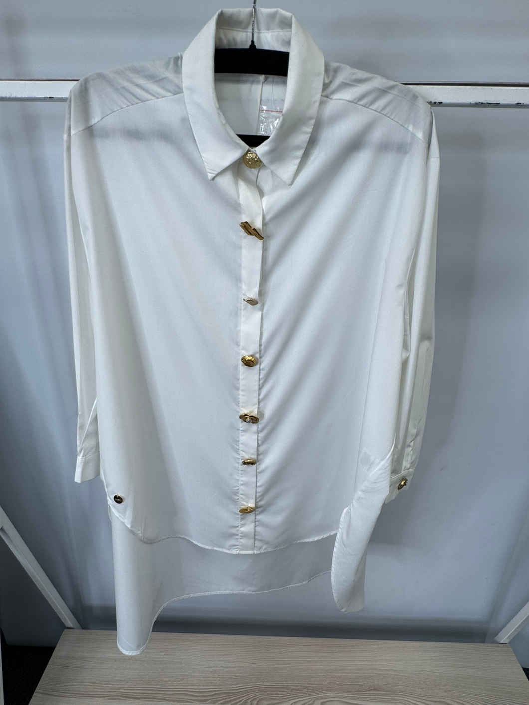 Malissa J white oversized women’s shirt with gold statement buttons - long sleeve collared fashion shirt for casual, office wear and evening outfits.