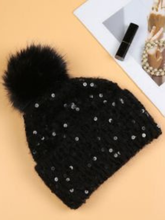 Load image into Gallery viewer, PCHA SD117 Black Sequin Pompom Hat – black knit hat with sequins and faux fur pompom, also available in red and cream. Perfect for chic winter styling.
