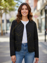 Load image into Gallery viewer, PINNS 665JK reversible quilted jacket in black and animal print with pockets, versatile lightweight layering piece for casual chic style.
