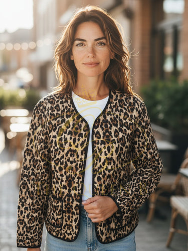 PINNS 665JK reversible quilted jacket in black and animal print with pockets, versatile lightweight layering piece for casual chic style.