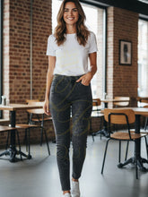 Load image into Gallery viewer, PINNS 721T reversible denim jeans in chocolate brown and animal print, slim-fit stretch cotton with two-in-one versatile style.
