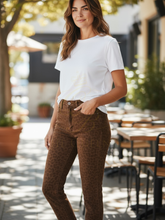 Load image into Gallery viewer, PINNS 721T reversible denim jeans in chocolate brown and animal print, slim-fit stretch cotton with two-in-one versatile style.

