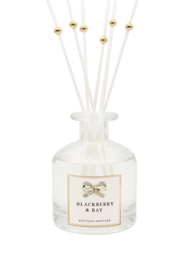 Luxury QB25 DIF9 Blackberry & Bay Diffuser with gold diamanté bow and white reeds, beautifully packaged for a sophisticated home fragrance gift.