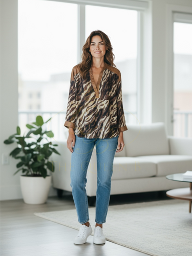 QBAW25 BC women’s animal print blouse with notch neckline, long sleeves, and relaxed silhouette – stylish top for versatile day-to-night wear.