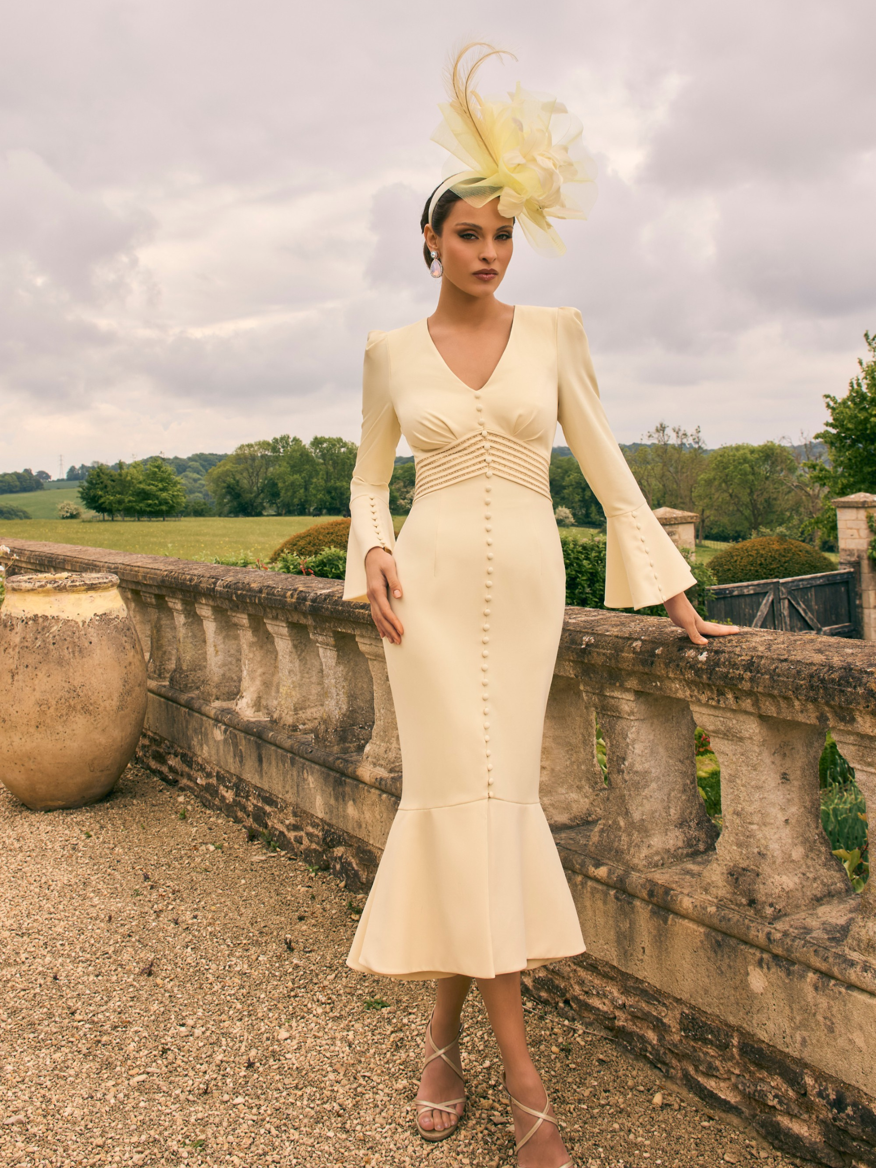 Veni Infantino 992752 Lemon crepe dress with beaded trim, covered buttons, V-neckline and fluted hem. Elegant occasion dress for weddings and special events.