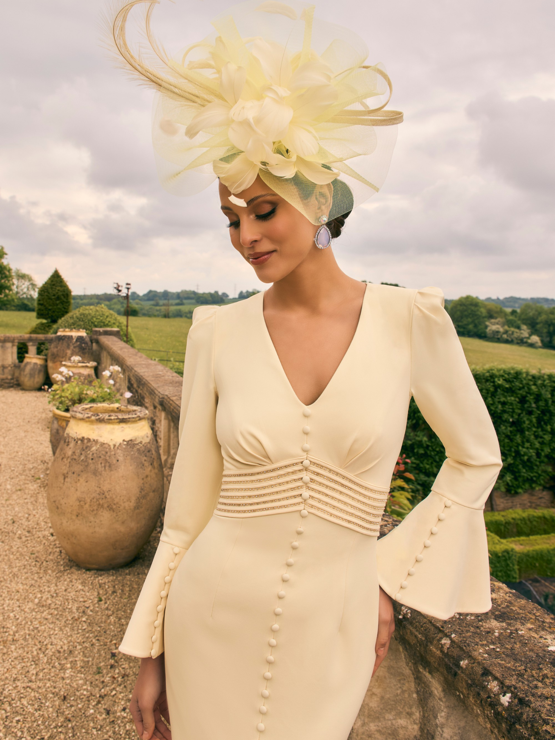 Veni Infantino 992752 Lemon crepe dress with beaded trim, covered buttons, V-neckline and fluted hem. Elegant occasion dress for weddings and special events.